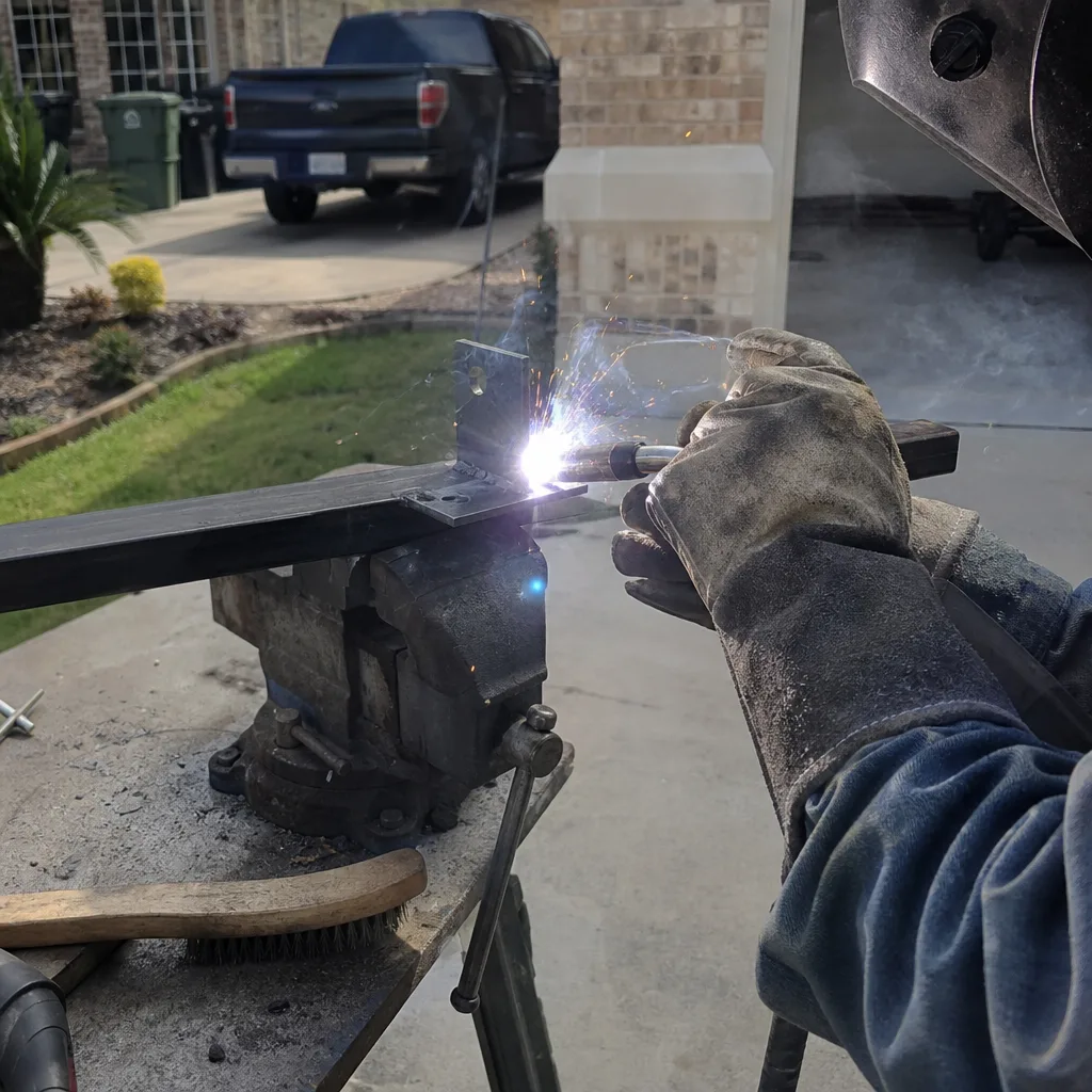 Professional welding and fabrication of gate parts in a workshop. in Pearland, TX